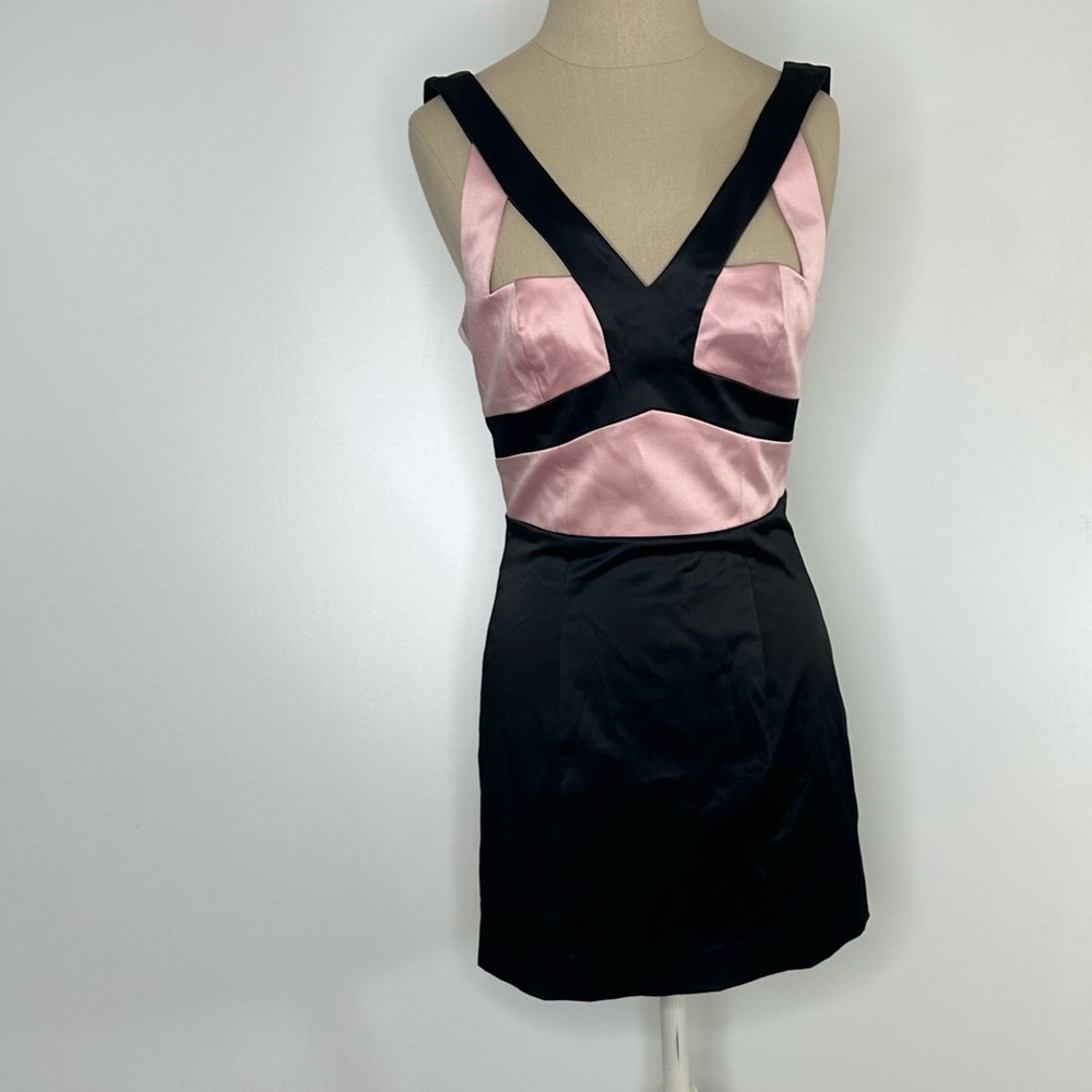 Bebe Pink and black cut-out mini dress